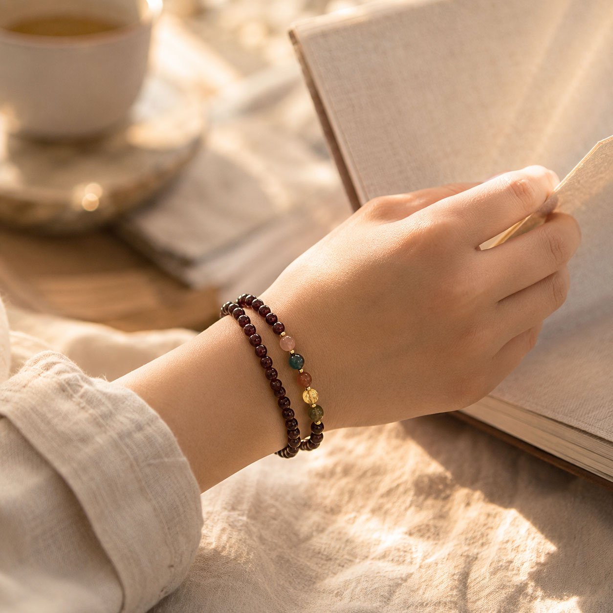 “The Eternal Flame” – Natural Garnet Wrap Bracelet | Meaningful Grounding Symbol 2 Handcrafted natural garnet wrap bracelet with layered strands of deep red gemstone beads, presented in the white Luxe Abundance Box.