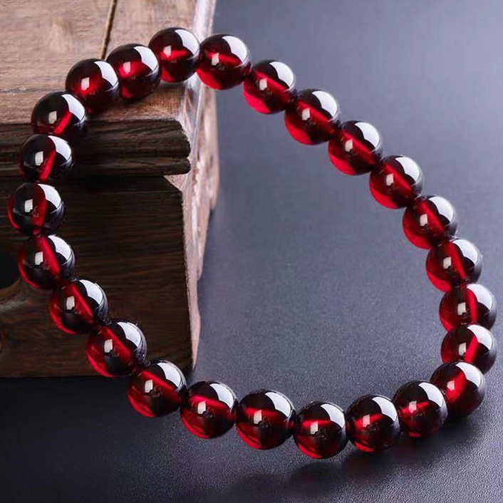 “The Wealth Alchemist” – Natural Red Garnet Prosperity Bracelet | Symbol of Confidence & Intention 4 Close-up of translucent red garnet beads showing deep luster and spiritual protection qualities